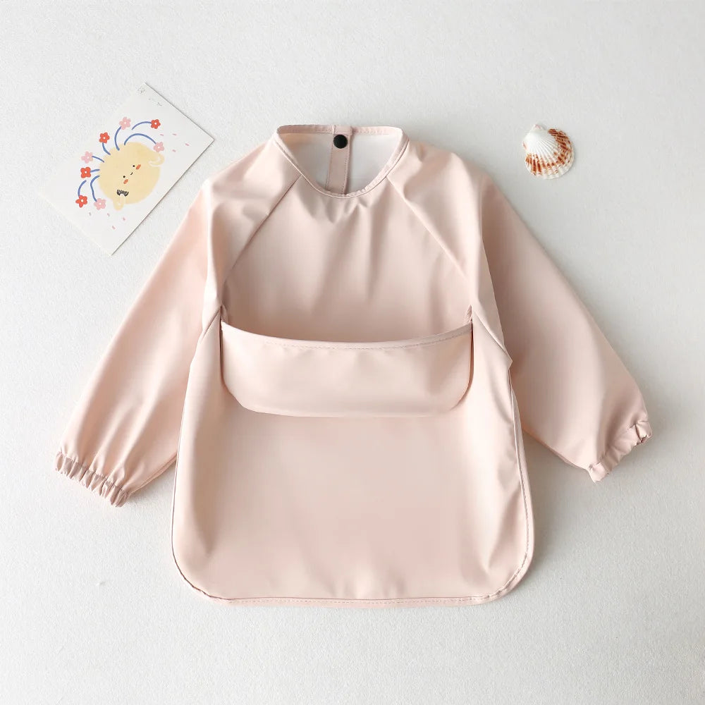 Tablier bavoir bébé rose claire 