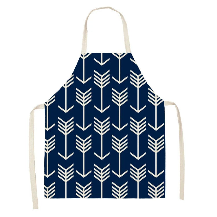 Tablier bleu avec des design blanc 